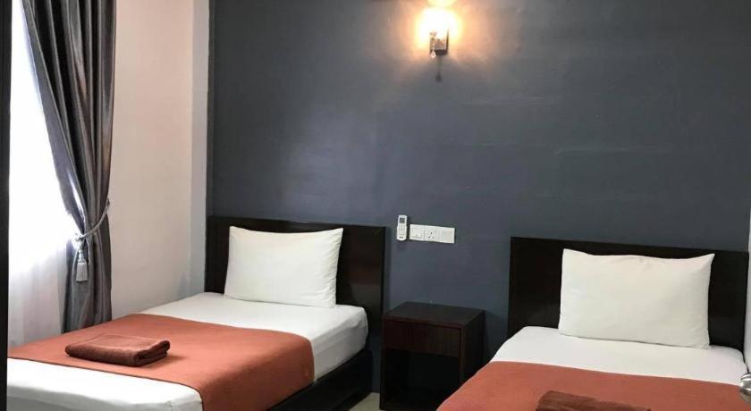 Capital O 90490 Zaques Hotel Sungai Petani Kültér fotó
